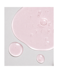 Texture of Janssen Cosmetics Eye Flash Fluid Ampoules on a white background.