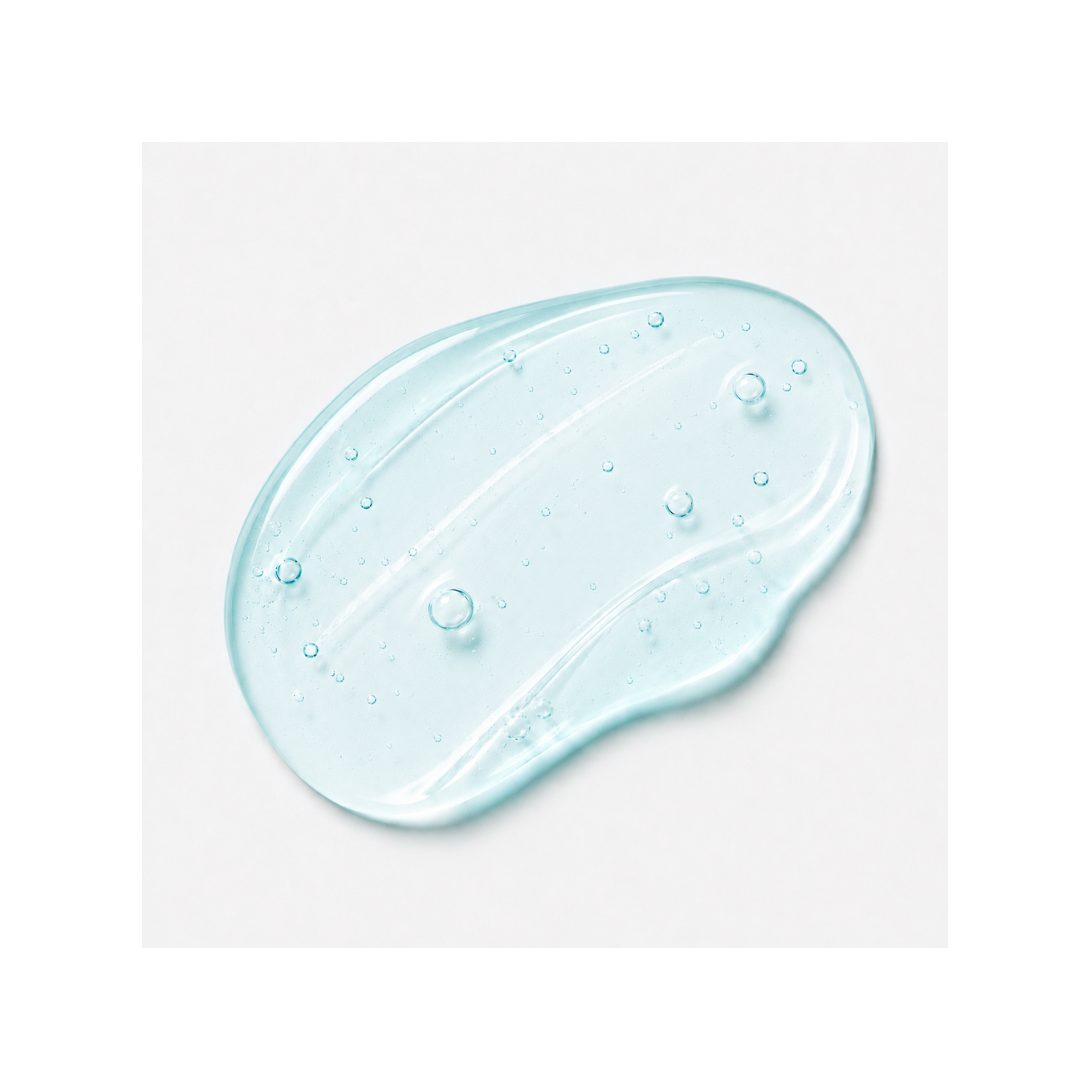 Blue skincare product smear on a white background