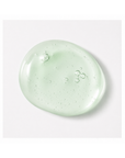 Texture of Janssen Cosmetics Refining Retinol Fluid Ampoules on a white background.